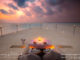 diner romantique coucher de soleil maldives table dans le sable