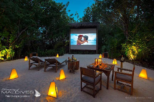 Gili Lankanfushi Maldives Dinner at The Jungle Cinema watch your favorite movie under the stars and enjoy a private tailored Dinner.