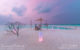 romantic sunset beach dinner at milaidhoo maldives