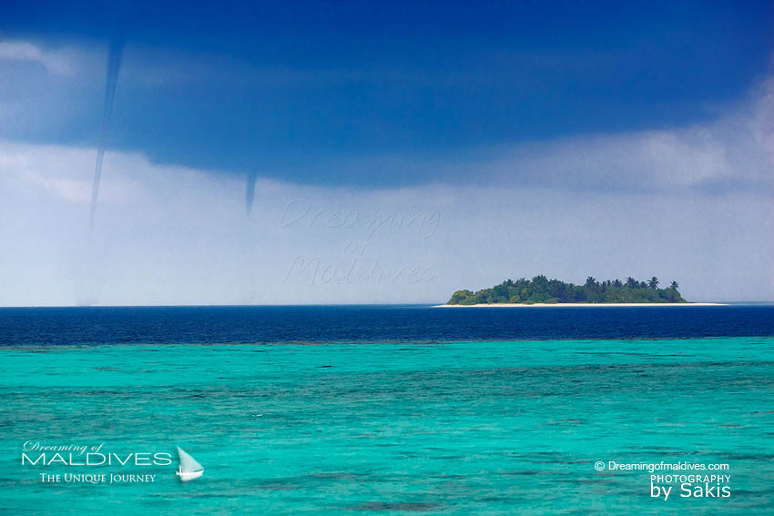 2 small tornadoes or Water Spouts during Maldives rainy season